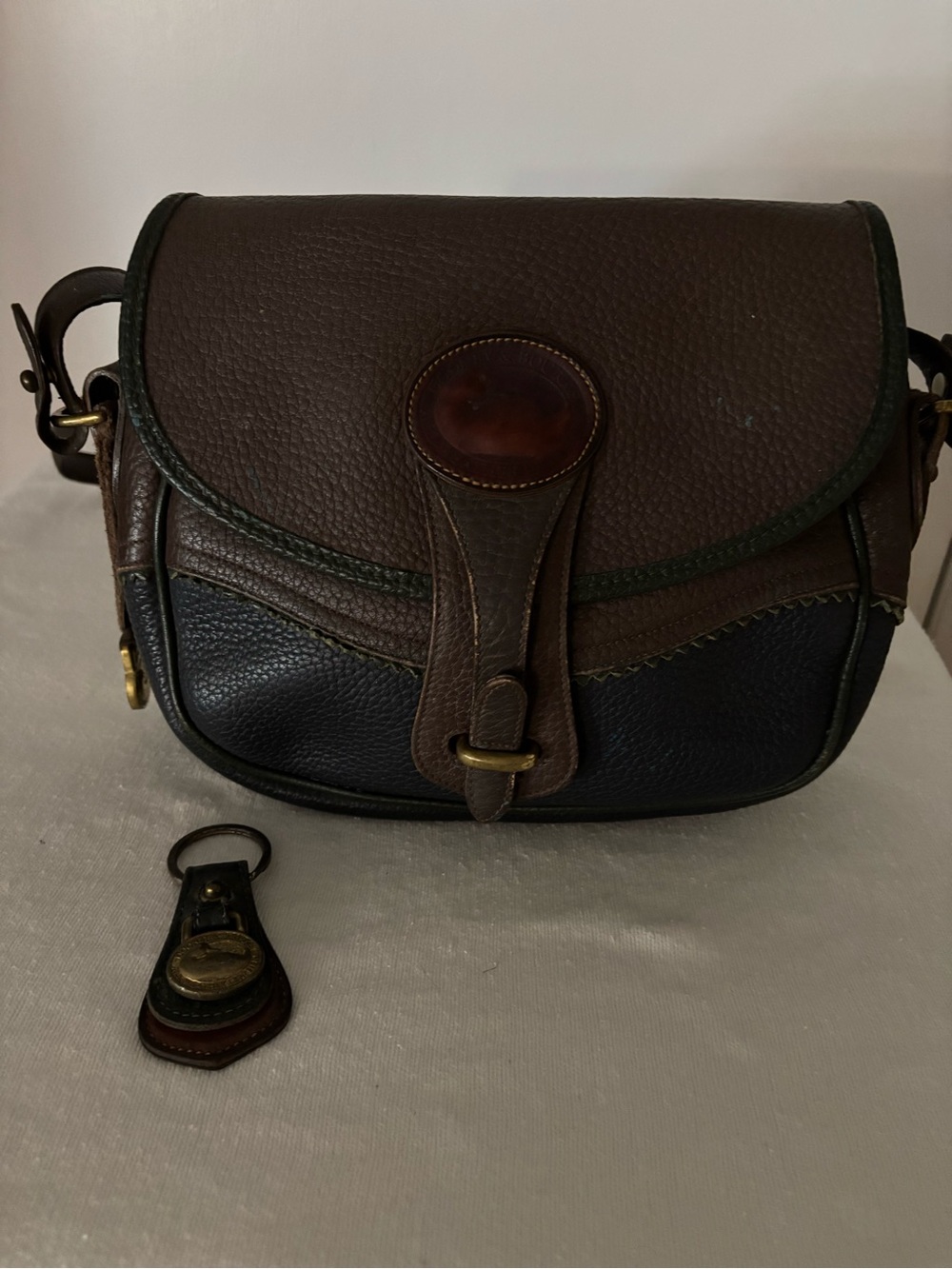 Dooney& Bourke  Brown and Black pebbled Leather Crossbody Bag - with key ring